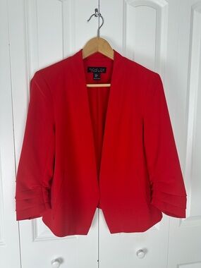 Rachel Zoe red blazer featuring an open front and ruched sleeves